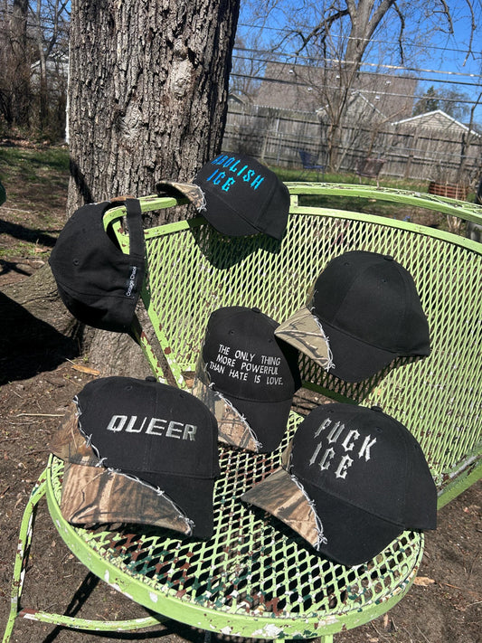 Custom embroidered barb wire camo trucker hat