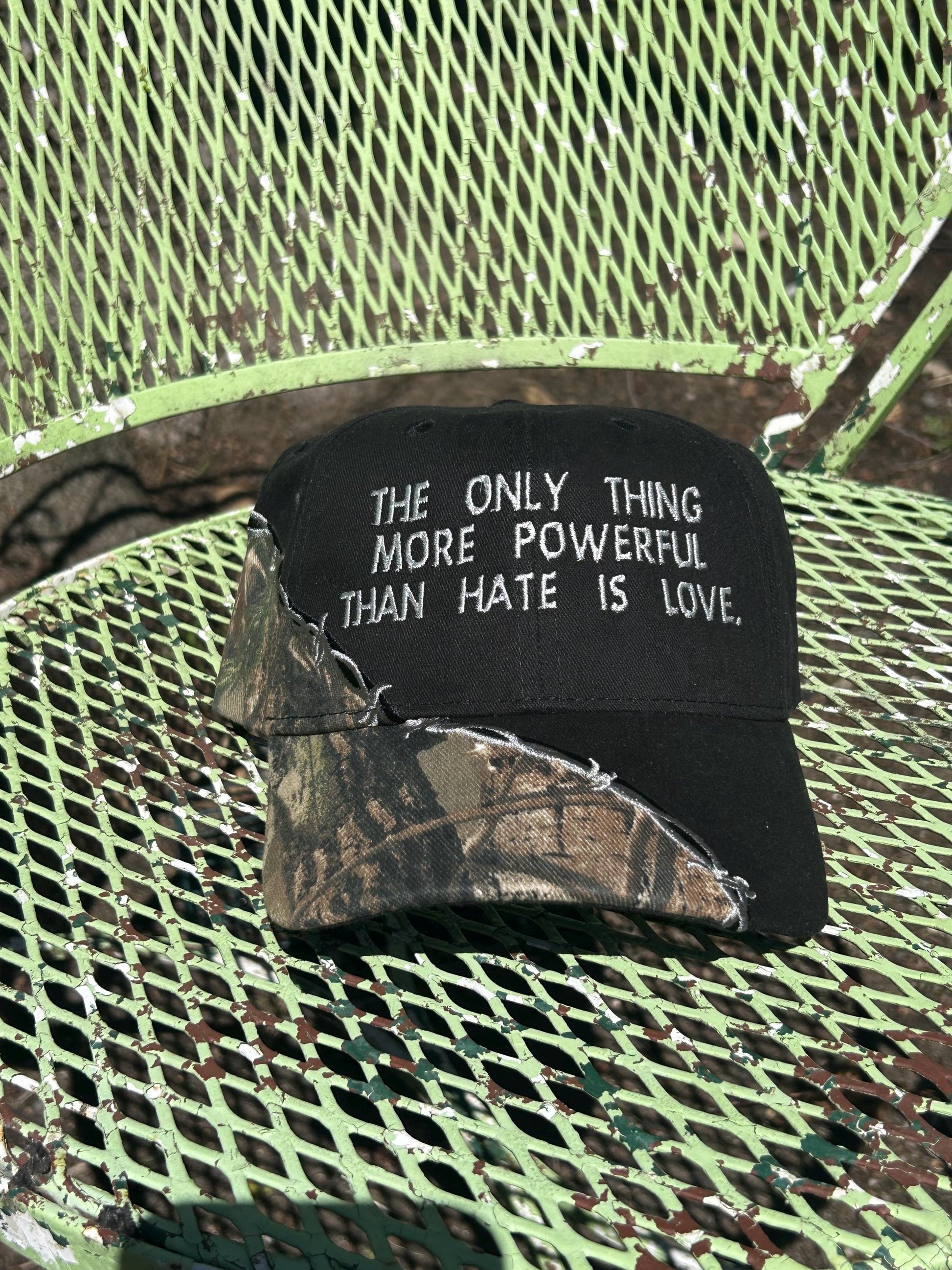 Custom embroidered barb wire camo trucker hat